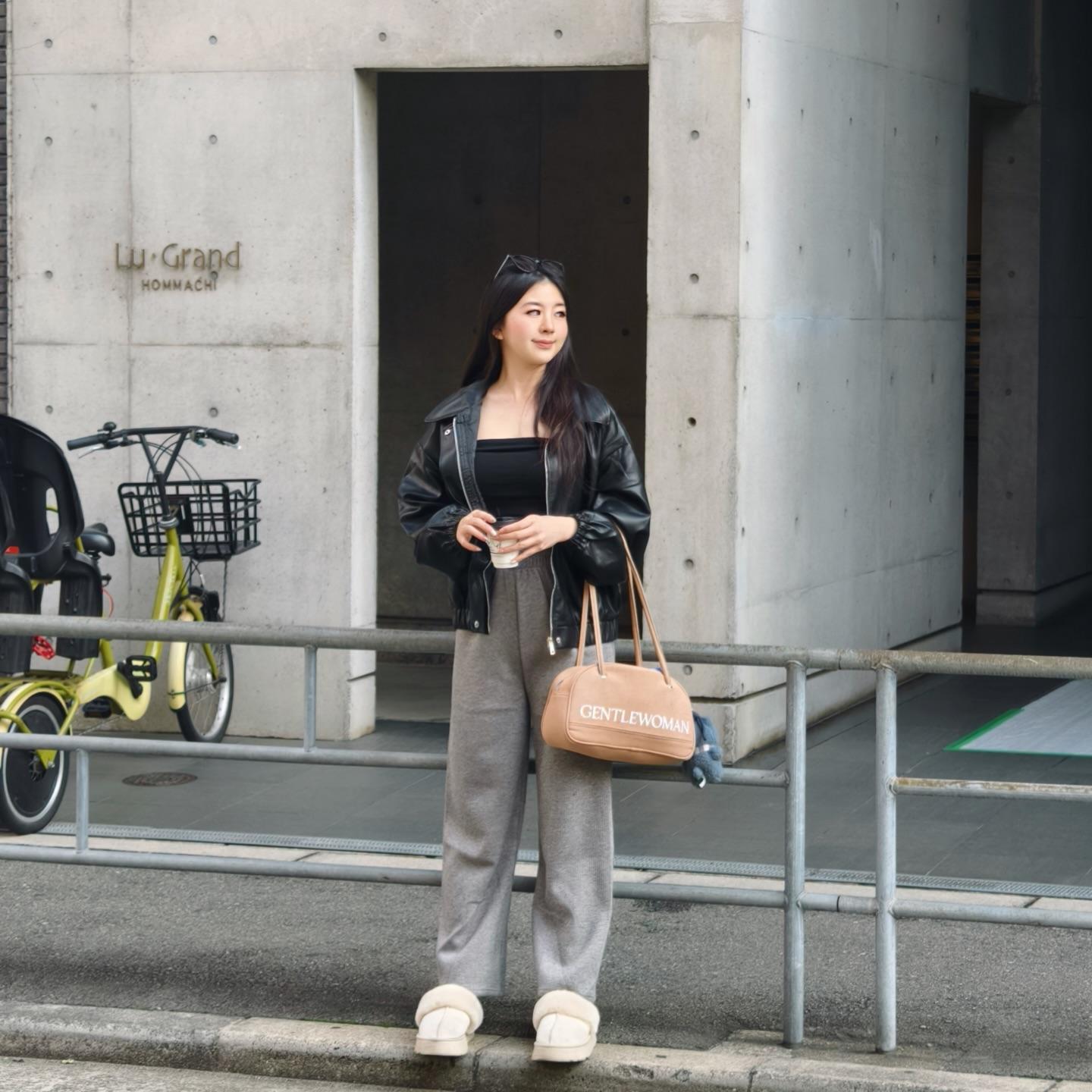 Fashion creator producing content on a city street
