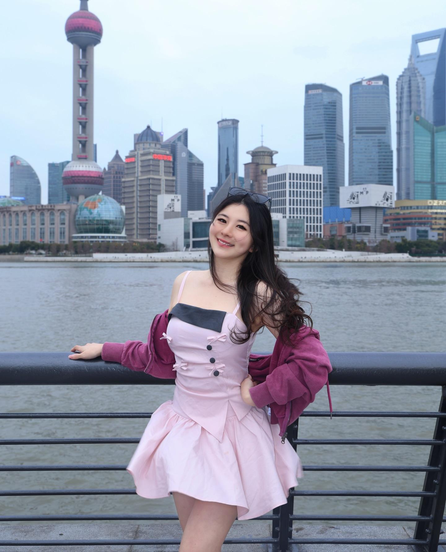 Travel creator producing content against the Shanghai skyline